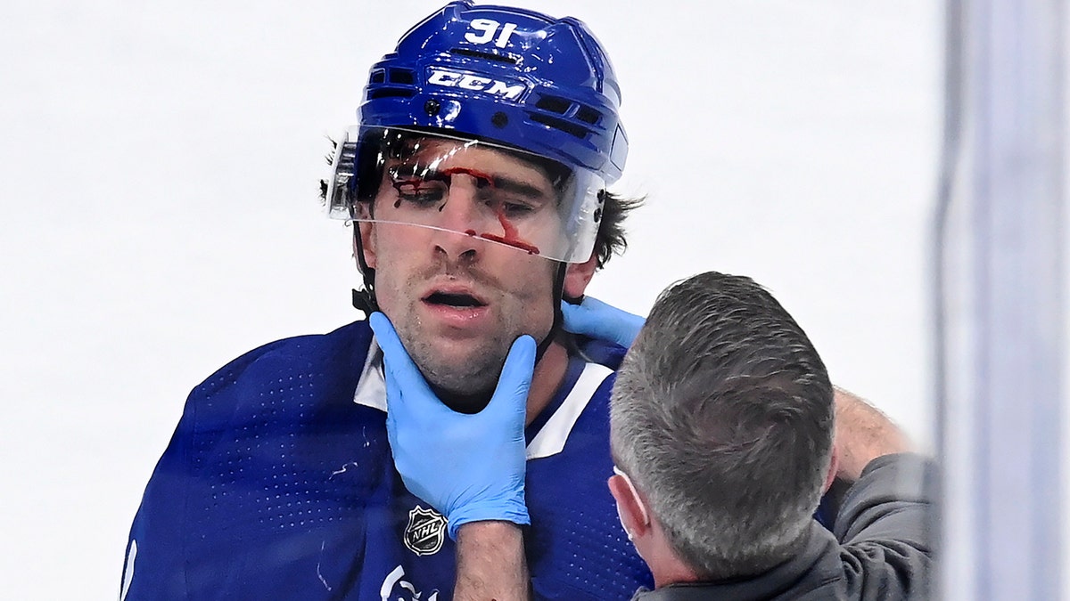 After Maple Leafs' John Tavares injured, Nick Foligno fights Canadiens' Corey  Perry; Twitter asks why