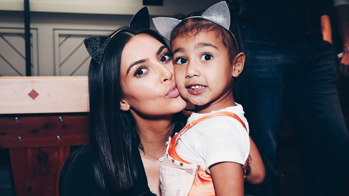 Kim Kardashian and her daughter, North West. (Photo by Rich Fury/Forum Photos via Getty Images)