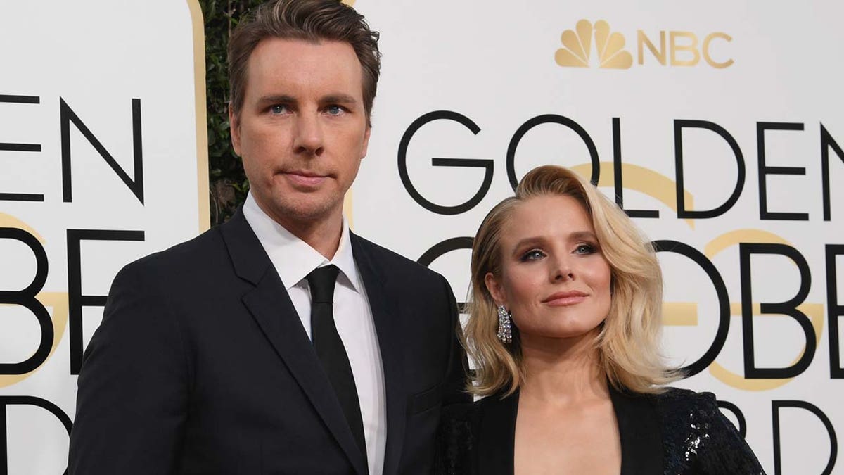 Dax Shepard and Kristen Bell at the golden globes both in black