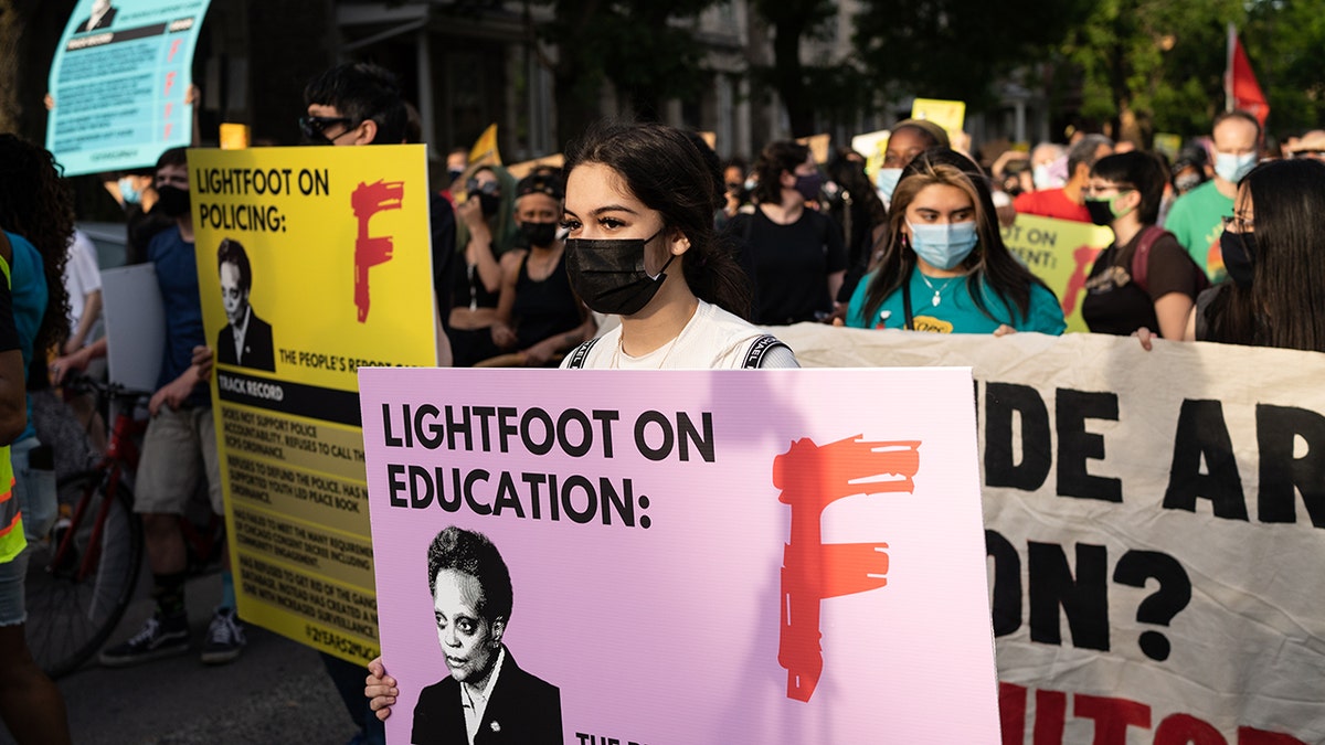 Demonstrators protest Chicago Mayor Lori Lightfoot on the second anniversary of the mayors time in office near her home in the Logan Square neighborhood in Chicago, Illinois on May 20, 2021. (Photo by Max Herman/NurPhoto via Getty Images)