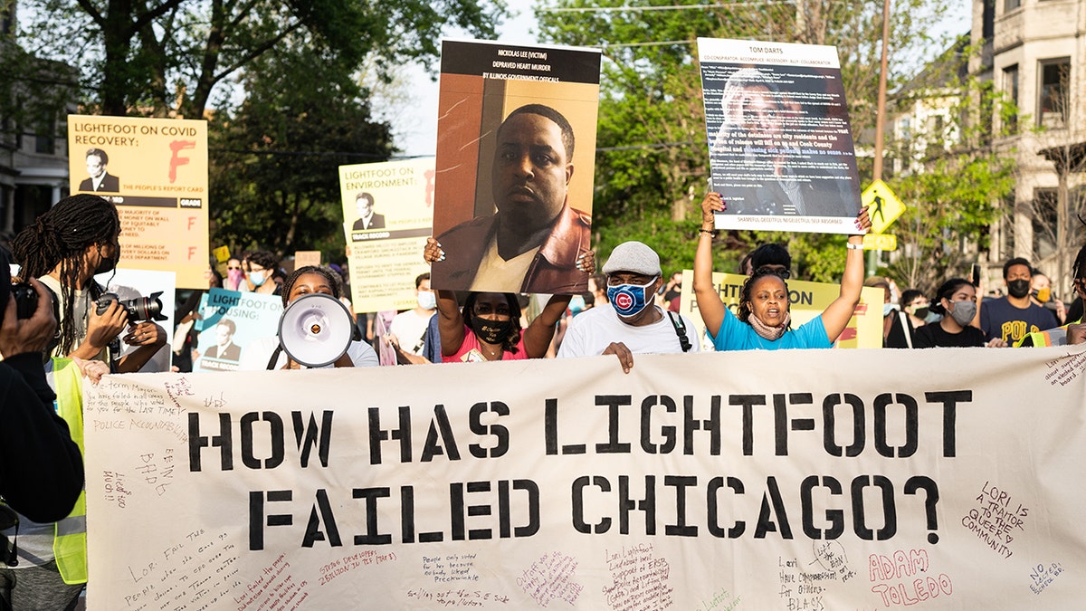 Demonstrators protest Chicago Mayor Lori Lightfoot on the second anniversary of the mayors time in office near her home in the Logan Square neighborhood in Chicago, Illinois on May 20, 2021. (Photo by Max Herman/NurPhoto via Getty Images)