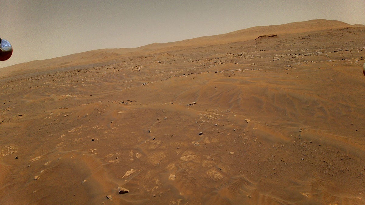 This image of Mars was taken from the height of 33 feet (10 meters) by NASA’s Ingenuity Mars helicopter during its sixth flight on May 22, 2021. (NASA/JPL-Caltech)