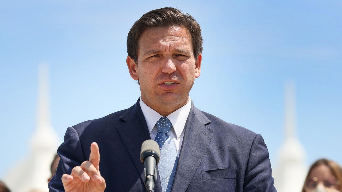 Florida Gov. Ron DeSantis speaks to the media about the cruise industry during a press conference at PortMiami on April 8, 2021, in Miami, Florida. 
