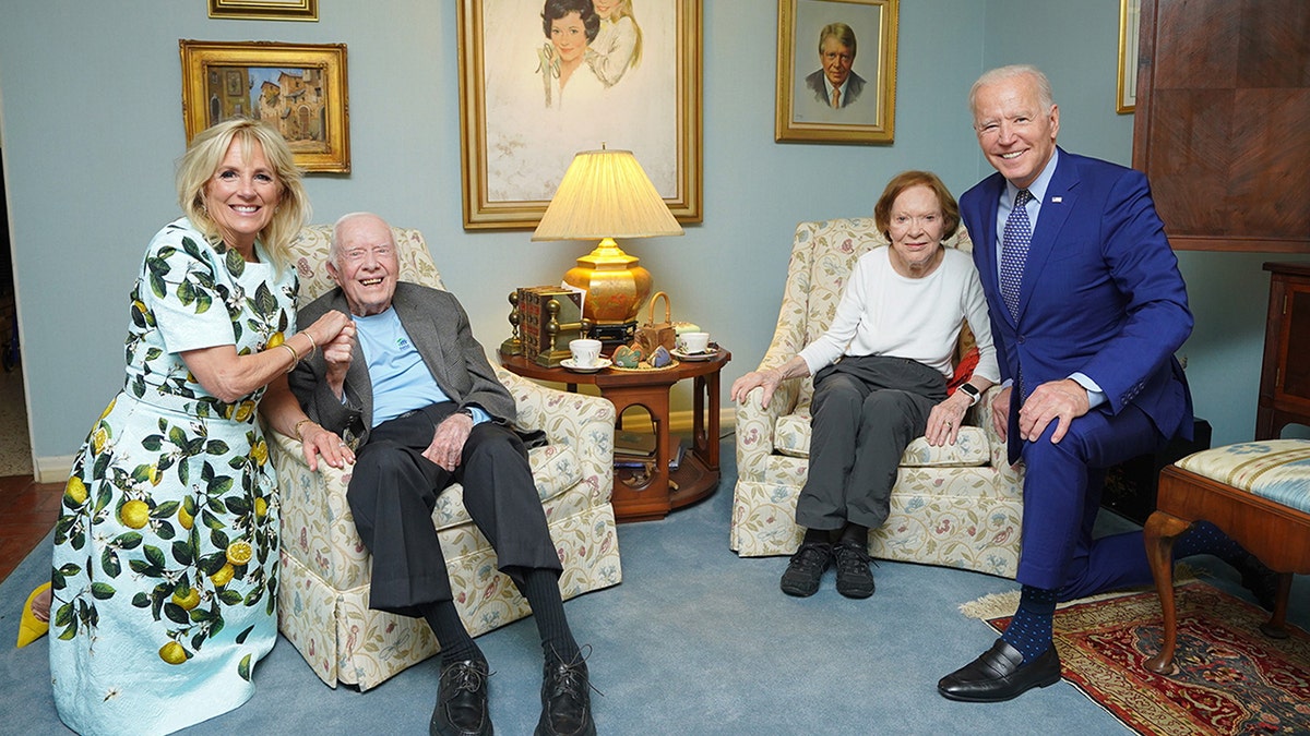 Jimmy Carter and his wife, Rosalynn pose with President Joe Biden and First Lady Jill Biden