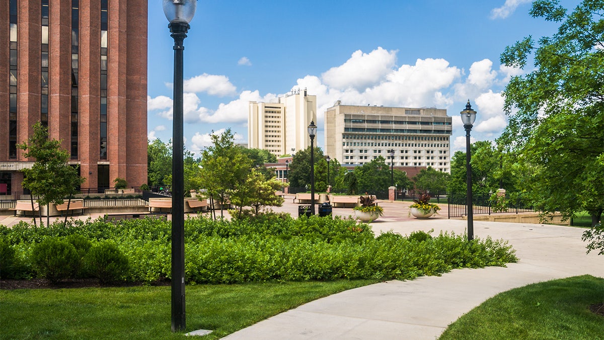 A view across the outside courtyard of the W.E.B Dubois library toward the Campus Center Hotel on the campus of the University of Massachusetts in Amherst, Massachusetts, a public institution.