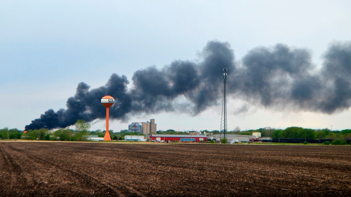 Smoke billows from a train derailment in Sibley, Iowa, on Sunday. (AP/Sioux City Journal)