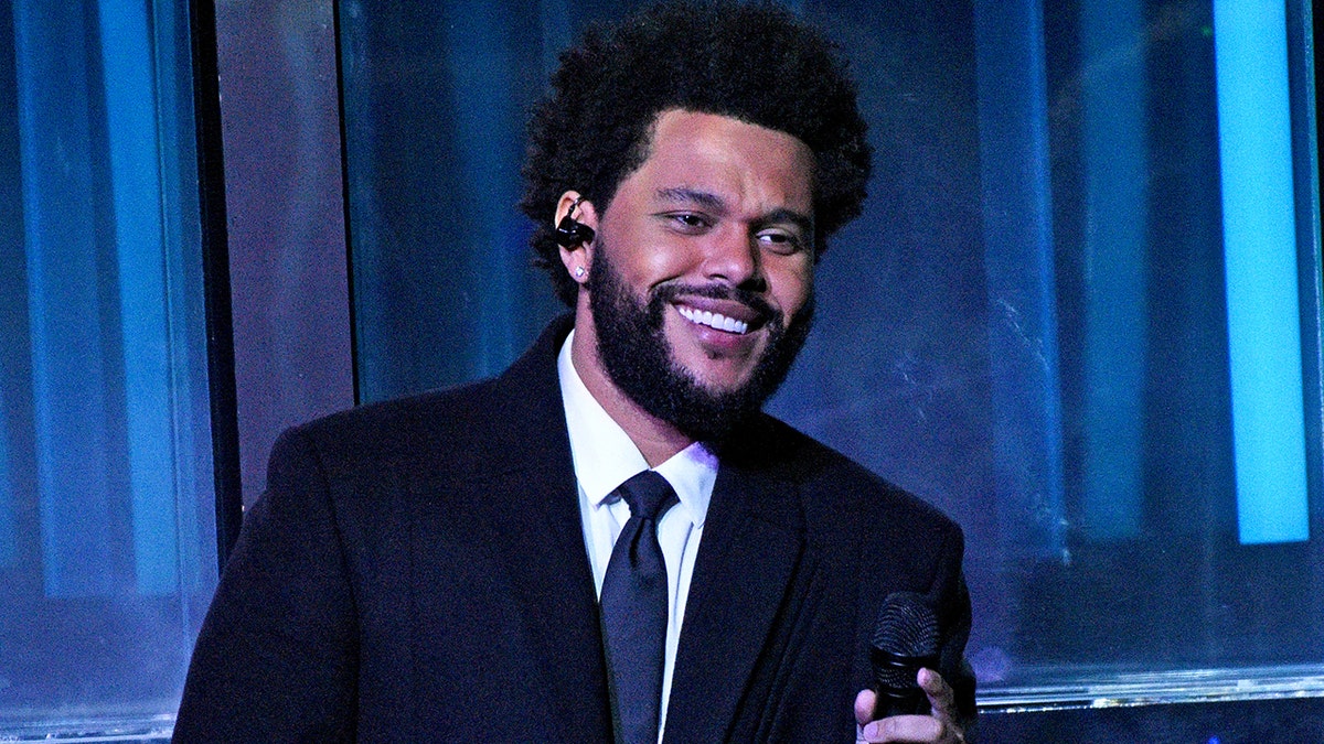 The Weeknd performs on stage at awards ceremony