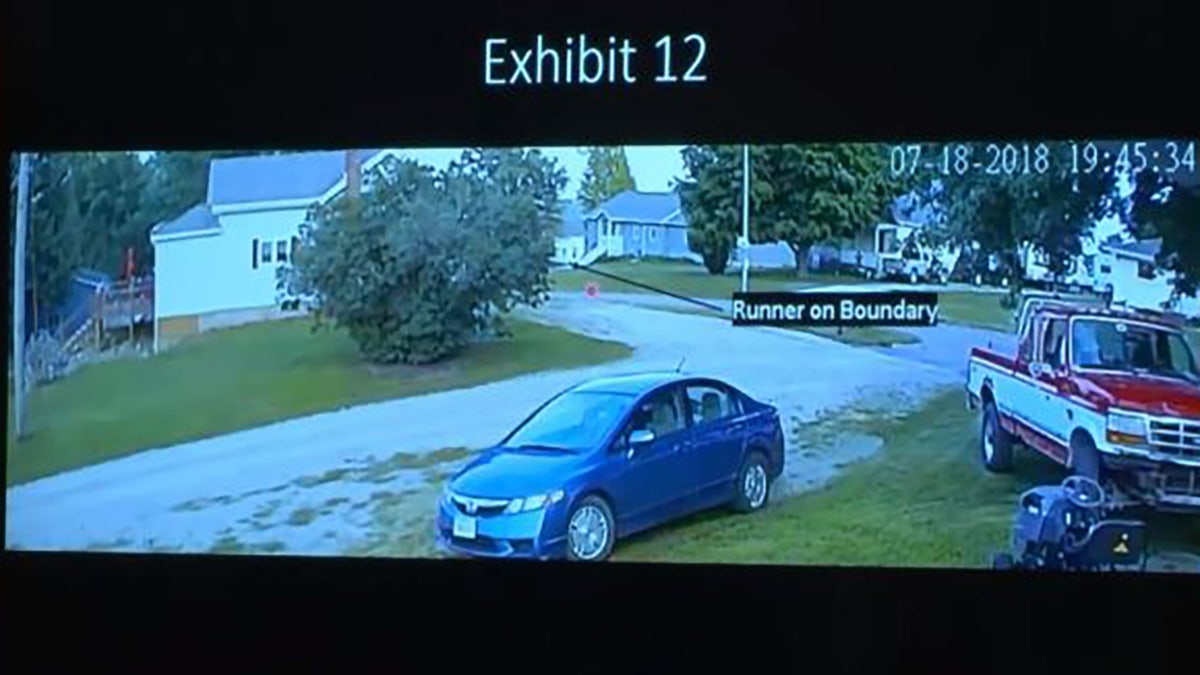 In an enhanced image taken from a homeowner's surveillance footage, a jogger can be seen running in the distance for a split second, investigators say. A still of the video was show as an exhibit in court during the trial for Cristhian Bahena Rivera, accused on murdering Mollie Tibbetts on her routine run.?