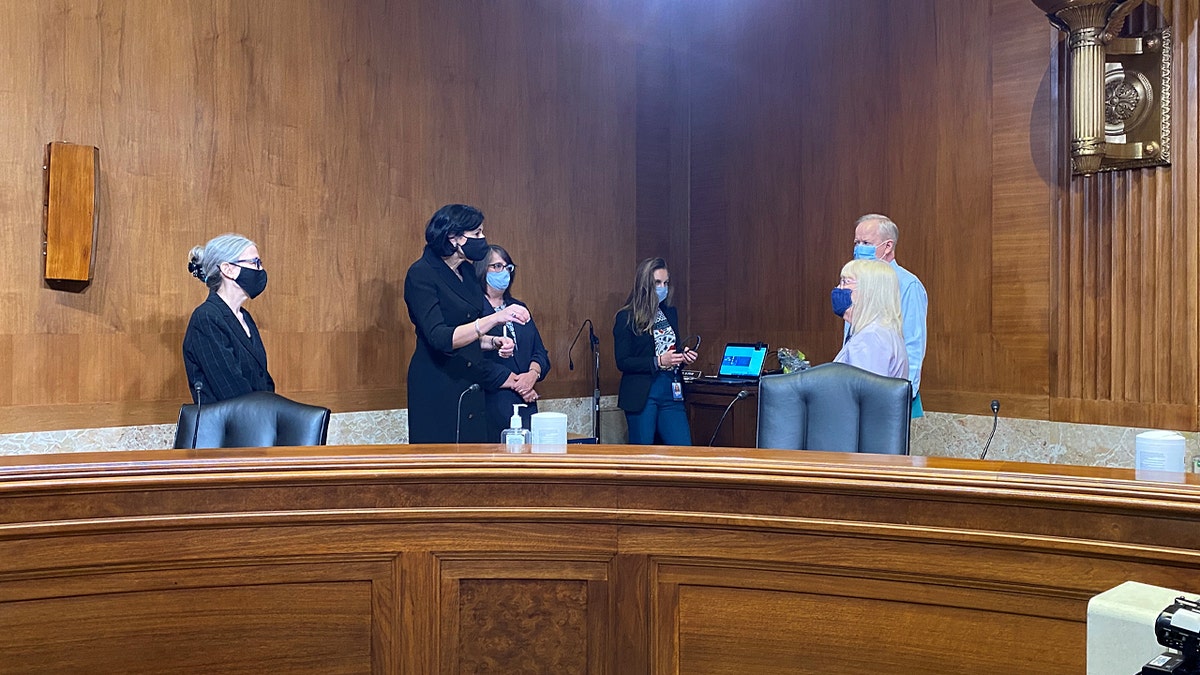Despite CDC guidance and mask requirements for vaccinated individuals being relaxed, particularly on the Senate side of the Capitol, Walensky has kept her mask on through Sen. Patty Murray’s opening remarks.