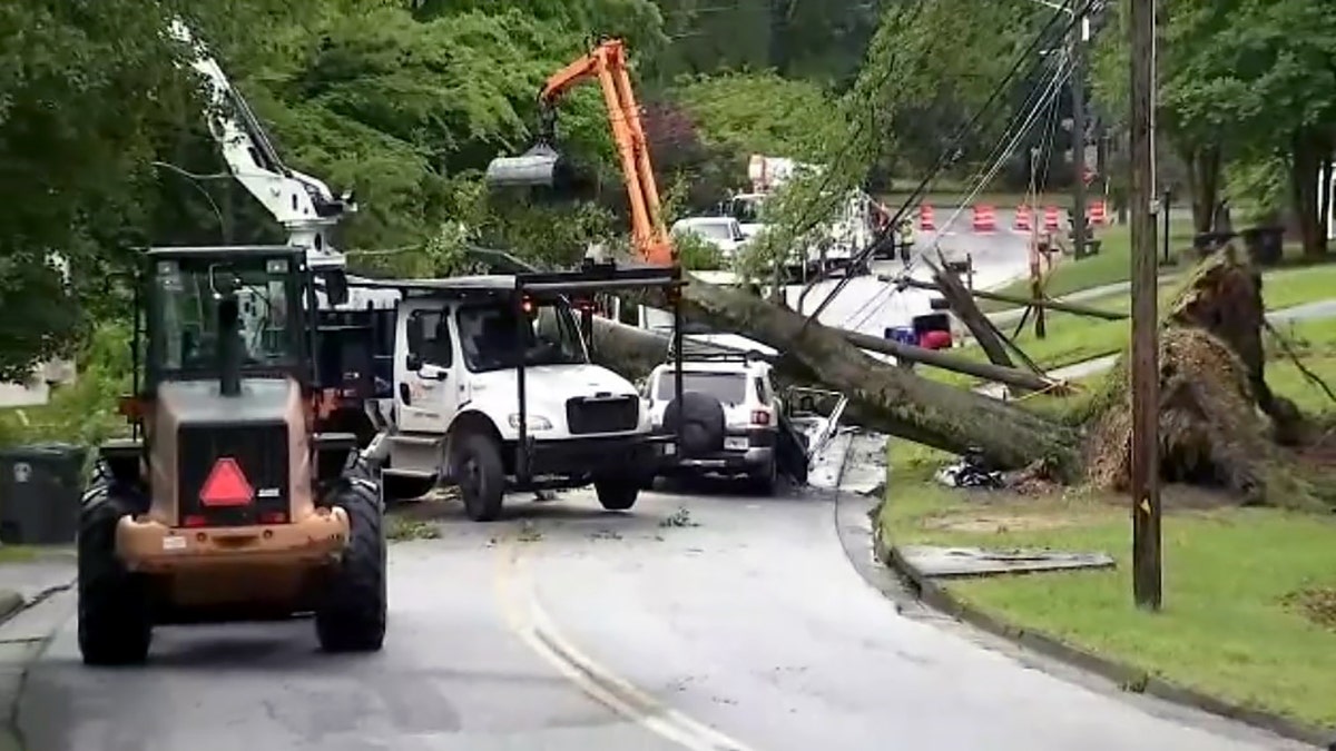 Storm damage in a neighborhood in Douglasville during tornado warnings in metro Atlanta. One fatality was reported when a tree fell on a car.