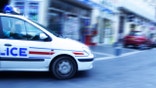 French police car zipping through the city.