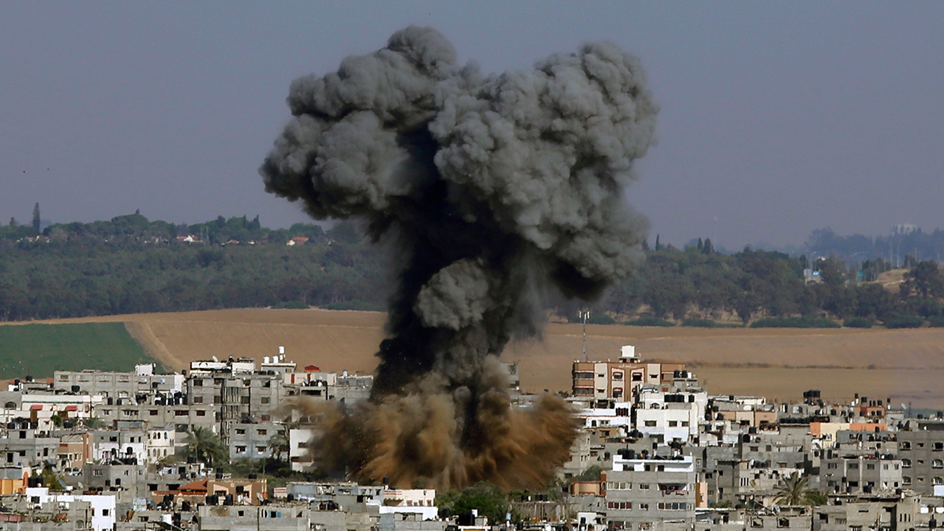 Smoke rises after an Israeli airstrike in Gaza City, Tuesday, May 11, 2021. (AP Photo/Hatem Moussa)