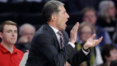 Former Louisville assistant charged by feds with extortion