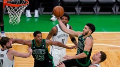 Tatum's 50 points carry Celtics over Nets 125-119