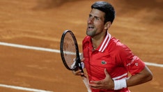 Novak Djokovic won't reveal vaccine status as Australian officials say unvaccinated unlikely to get visas