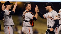 Tauchman robs Pujols of winning HR, Giants top Dodgers in 10