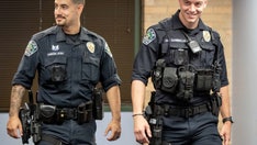 Hero cops draw women's attention after dramatic rescue of Austin man from burning truck