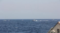 US warships fire warning shots at Iranian gunboats in the Strait of Hormuz