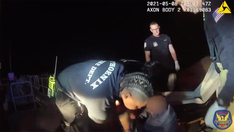 Arizona police officers save man from drowning after his wheelchair tips over into canal, video shows