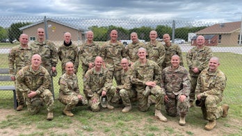 Soldiers shave heads for battle buddy's sister fighting cancer