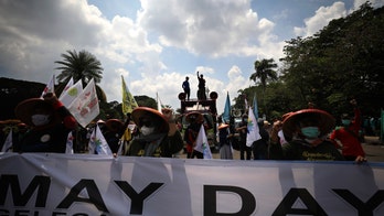 May Day protesters in Paris demand more job protections amid pandemic