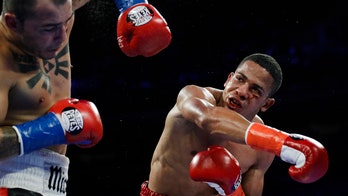 Puerto Rican boxer turns himself in after lover found dead