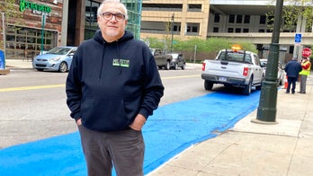 Detroit pizza man paints street, tries to save people dough