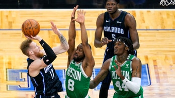 Walker returns from injury, scores 32 as Celtics whip Magic