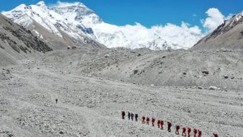 China opens Everest's north side to 38 virus-tested climbers