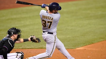Houser homers, fans 10, Brewers stop 6-game skid, beat Miami