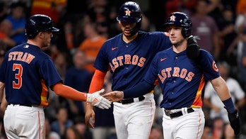 Four-run eighth sends Astros past Rangers, 6-2