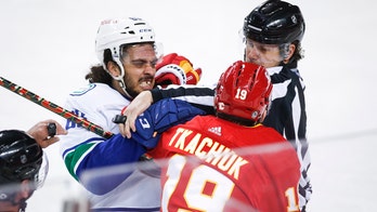 Tkachuk scores twice, Flames beat Canucks 6-2 in finale