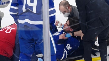 Maple Leafs' John Tavares stretchered off ice after hit to head in Game 1 against Canadiens