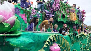 Alabama city throws 'Tardy Gras' parade as pandemic ebbs