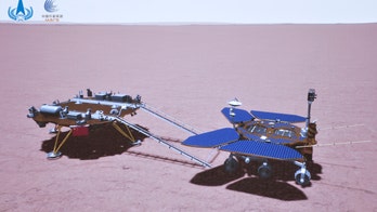 China's Mars rover touches ground on red planet