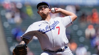 Lux slam, pitcher Urías 3 RBIs send Dodgers past Giants 11-5