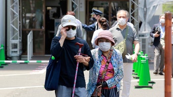 Japan opens mass vaccine centers 2 months before Olympics