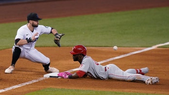 Herrera's hitting, arm helps Phillies beat Marlins 3-2