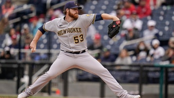 Woodruff outpitches Scherzer, García HR, Brewers blank Nats