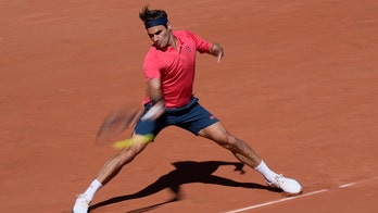 Le grand retour: Federer wins return to Paris, Slam action