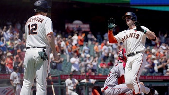 Giants hit 3 more homers to back Cueto, beat Angels 6-1