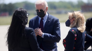 Biden heaps praise on 'Squad' member Tlaib -- after they argue on Detroit airport tarmac