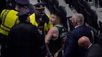 Celtics fan who appeared to throw water bottle at Kyrie Irving identified, facing charges