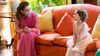 Kate Middleton keeps promise to wear a pink dress for young cancer patient