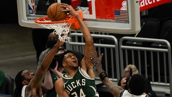 Antetokounmpo scores 49 points as Bucks beat Nets 117-114