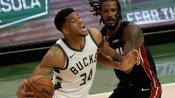 Bucks beat Heat 122-108, maintain bid for East's No. 2 seed