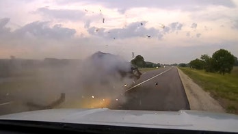 Illinois State Trooper's vehicle hit by alleged drunk driver after traffic stop, video shows