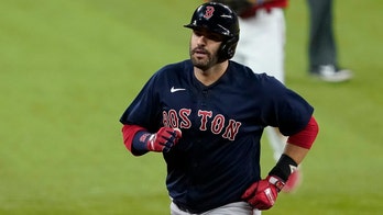 Martinez 2 HRs, leads majors with 9, as Red Sox beat Rangers