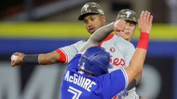 Phillies' Joe Girardi, Jean Segura have dugout spat, manager downplays it as 'bench conversation'