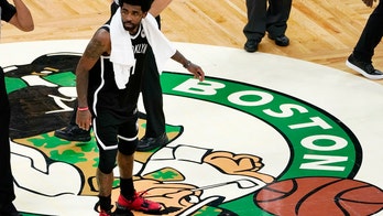 Kevin Garnett takes shot at Kyrie Irving over Celtics logo stomp, mum on fan's behavior